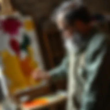 An artist applying thinned paint on canvas