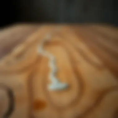 A wooden table with glue residue