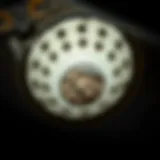 A close-up view of a steam iron with visible mineral deposits inside the steam holes